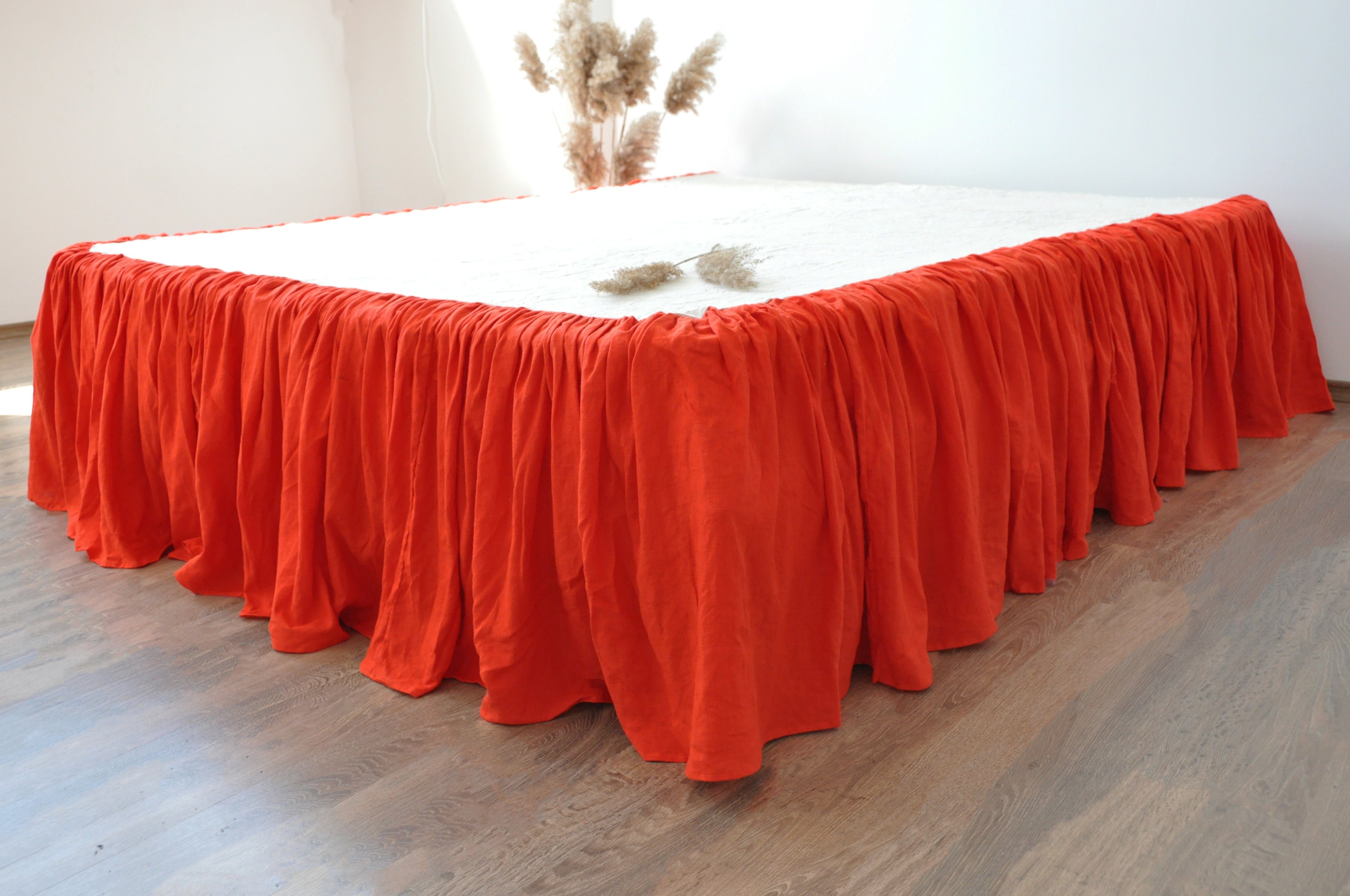 Bright orange linen ruffle bed skirt