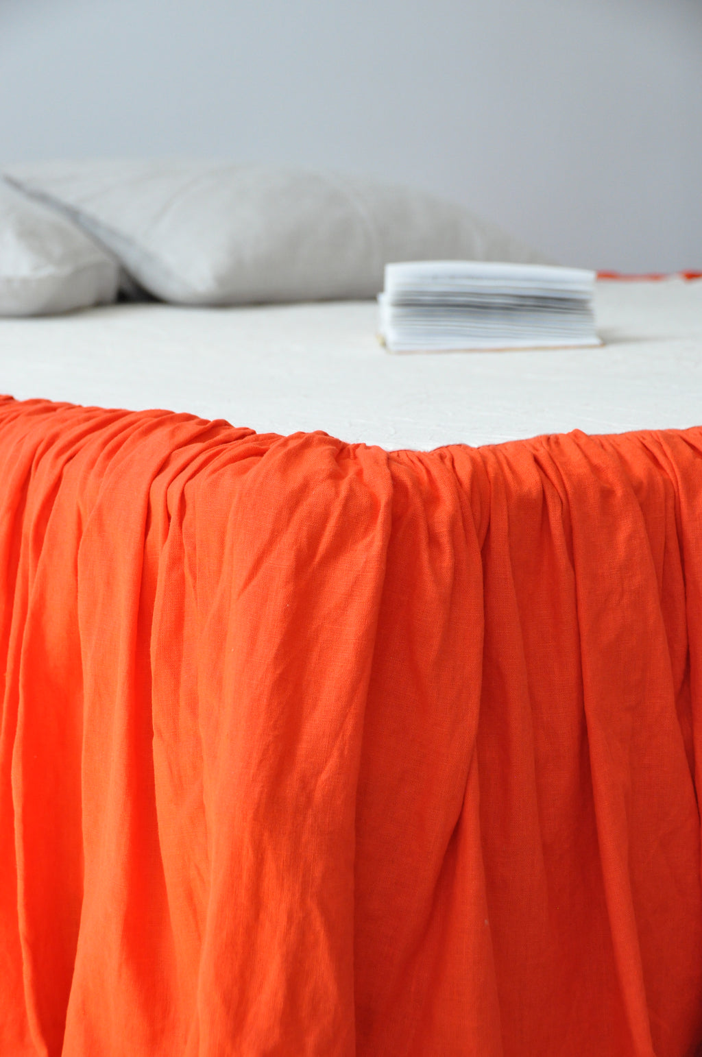 Bright orange linen ruffle bed skirt