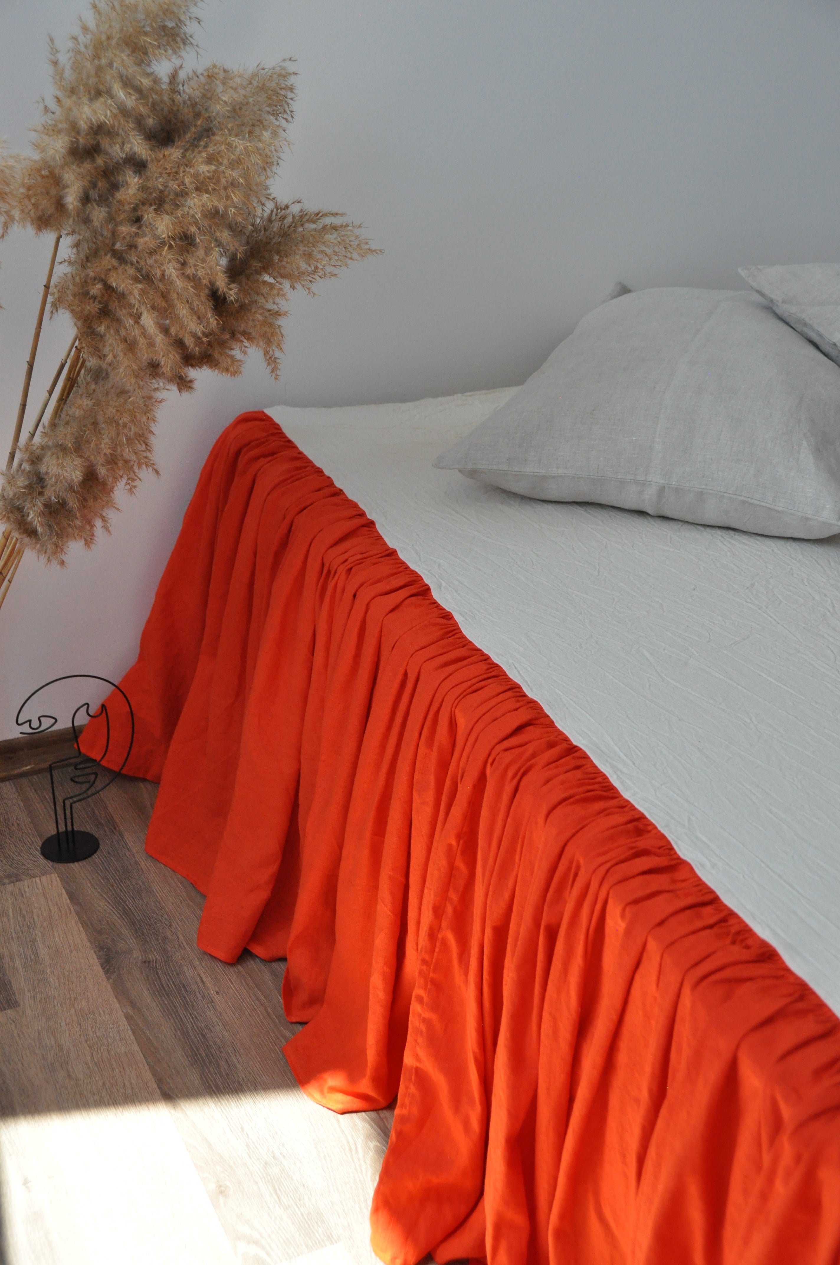 Bright orange linen ruffle bed skirt