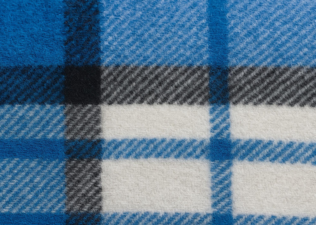 Blue and white half wool tartan blanket