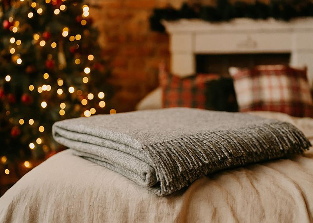 Light gray plaid merino wool blanket