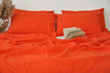 Bright orange flat sheet - True Things