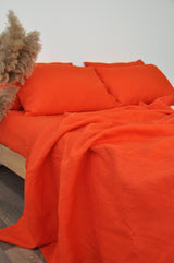 Bright orange flat sheet - True Things