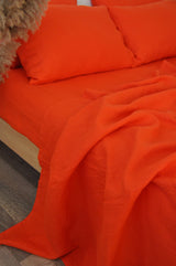 Bright orange flat sheet - True Things