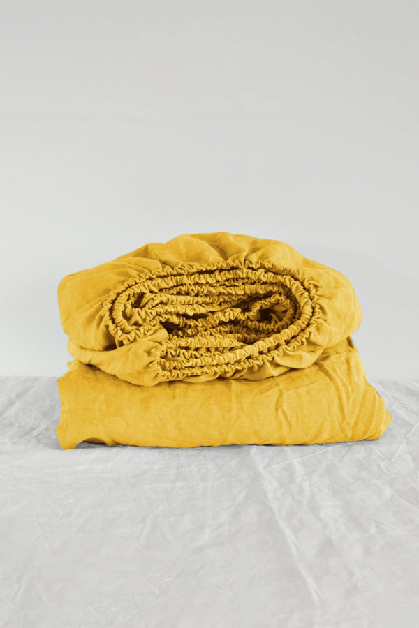 Bright yellow fitted sheet - True Things