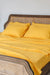 Bright yellow flat sheet - True Things