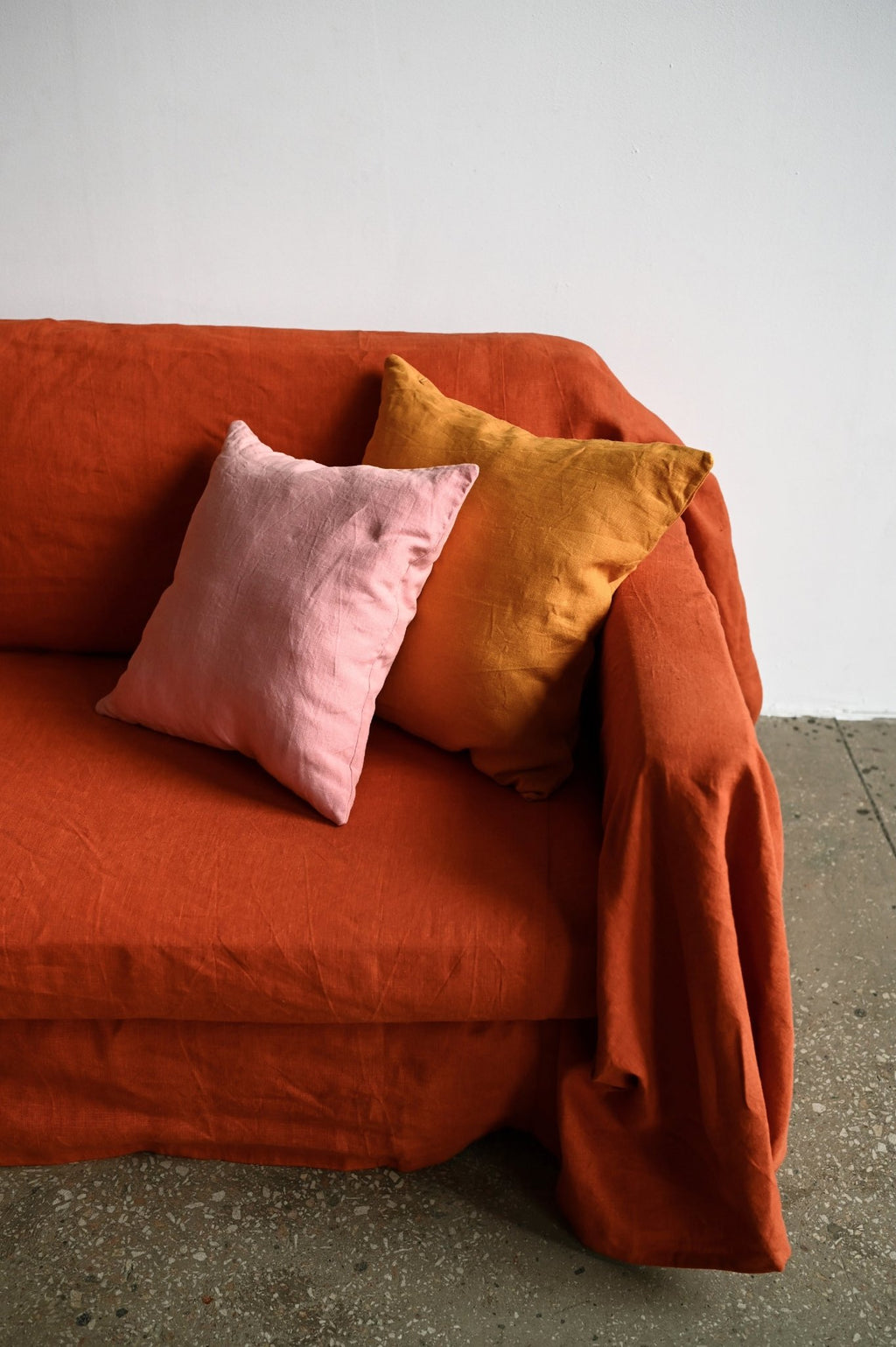 Burnt orange sofa slipcover - True Things
