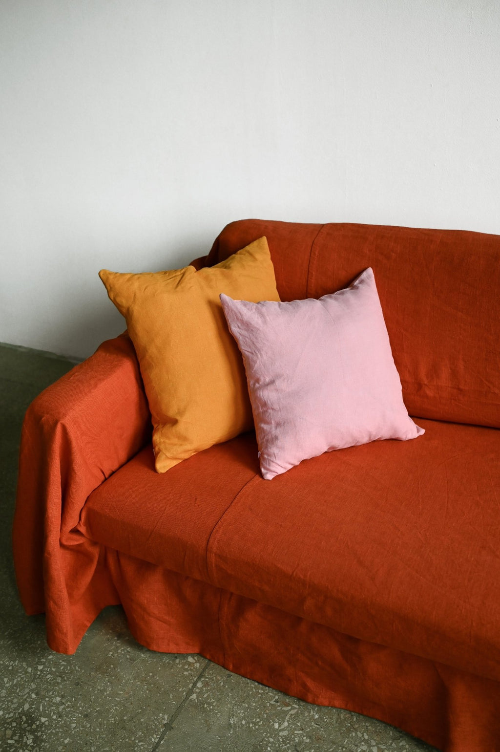 Burnt orange sofa slipcover - True Things