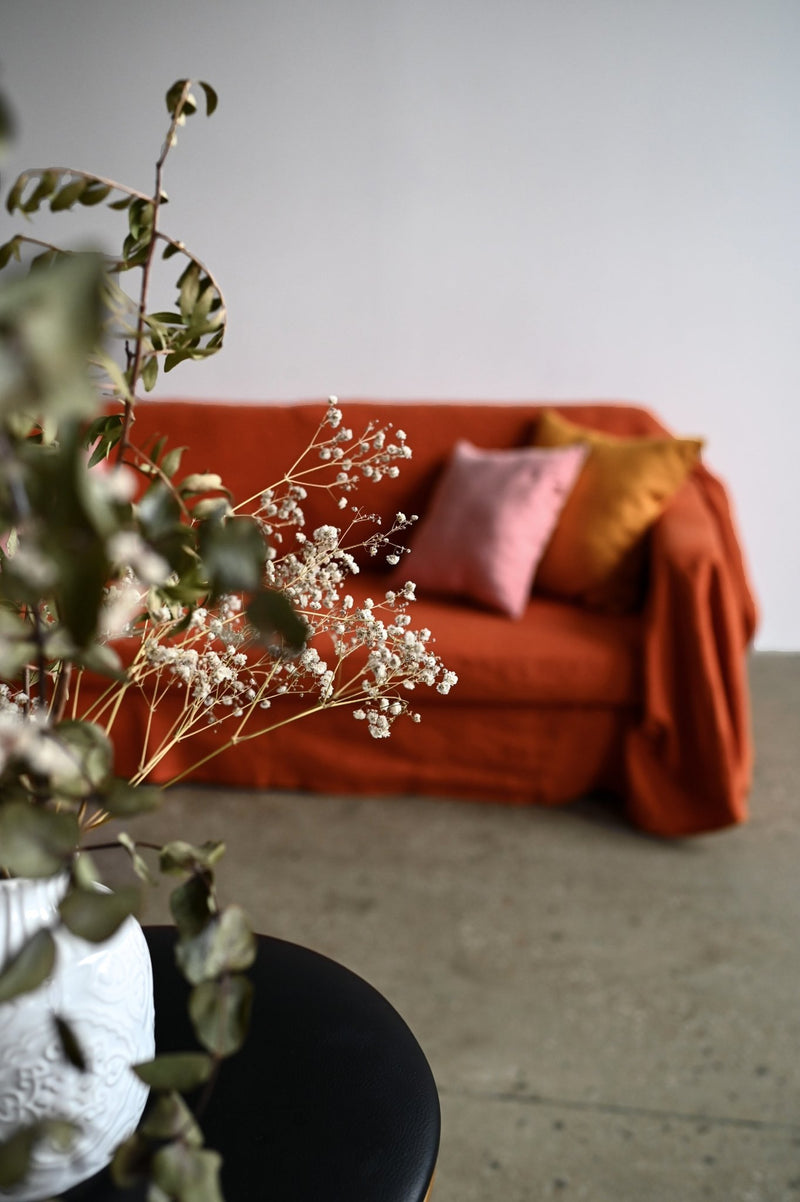 Burnt orange sofa slipcover - True Things