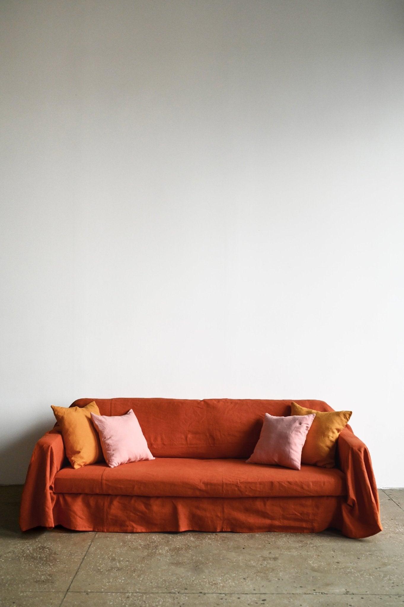 Burnt orange sofa slipcover - True Things