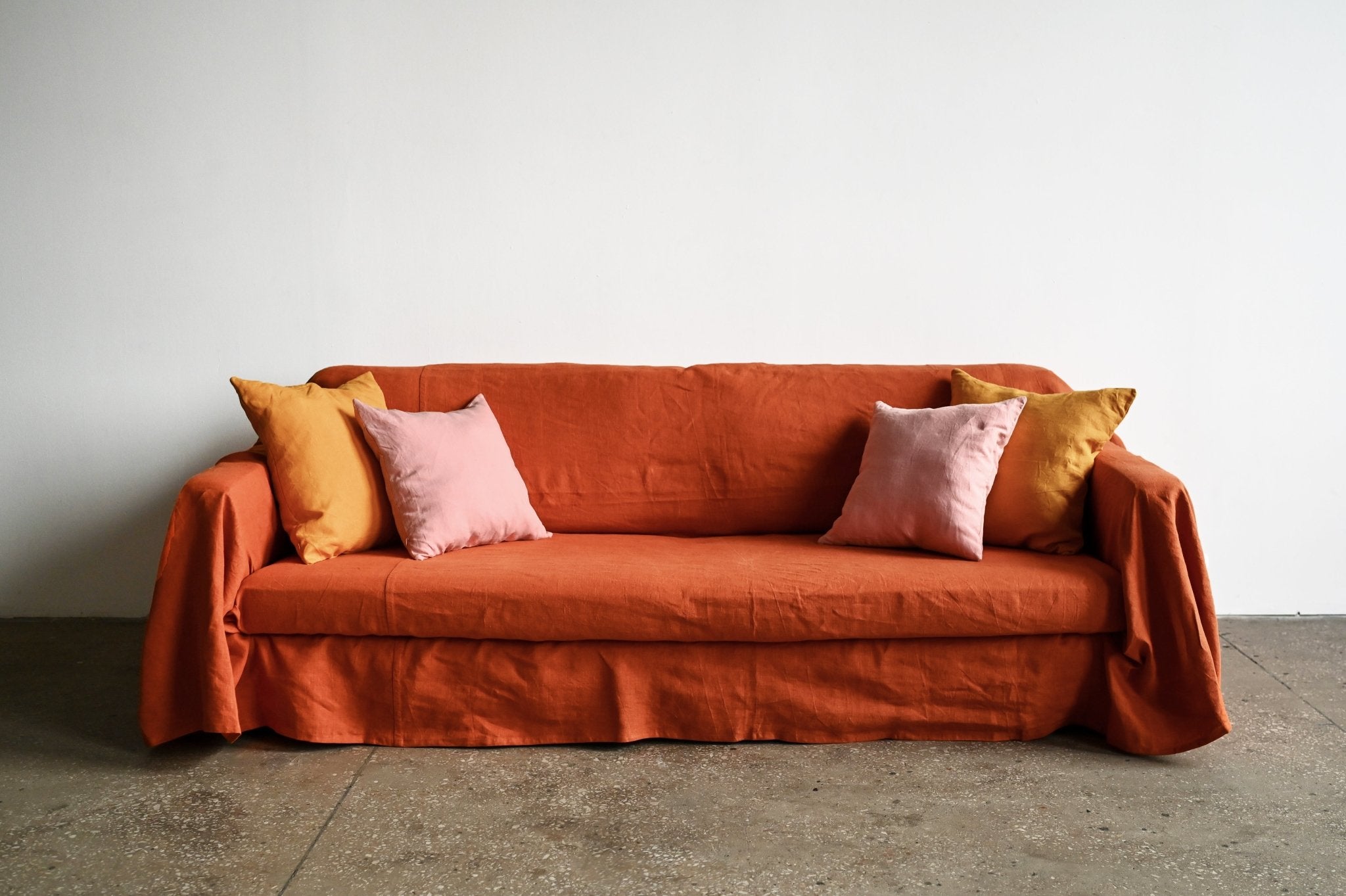 Burnt orange sofa slipcover - True Things
