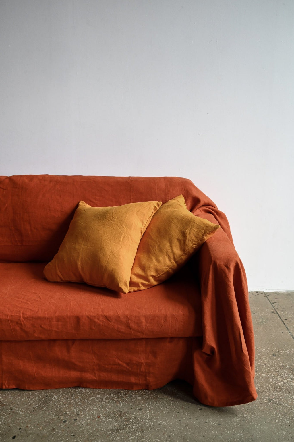Burnt orange sofa slipcover - True Things