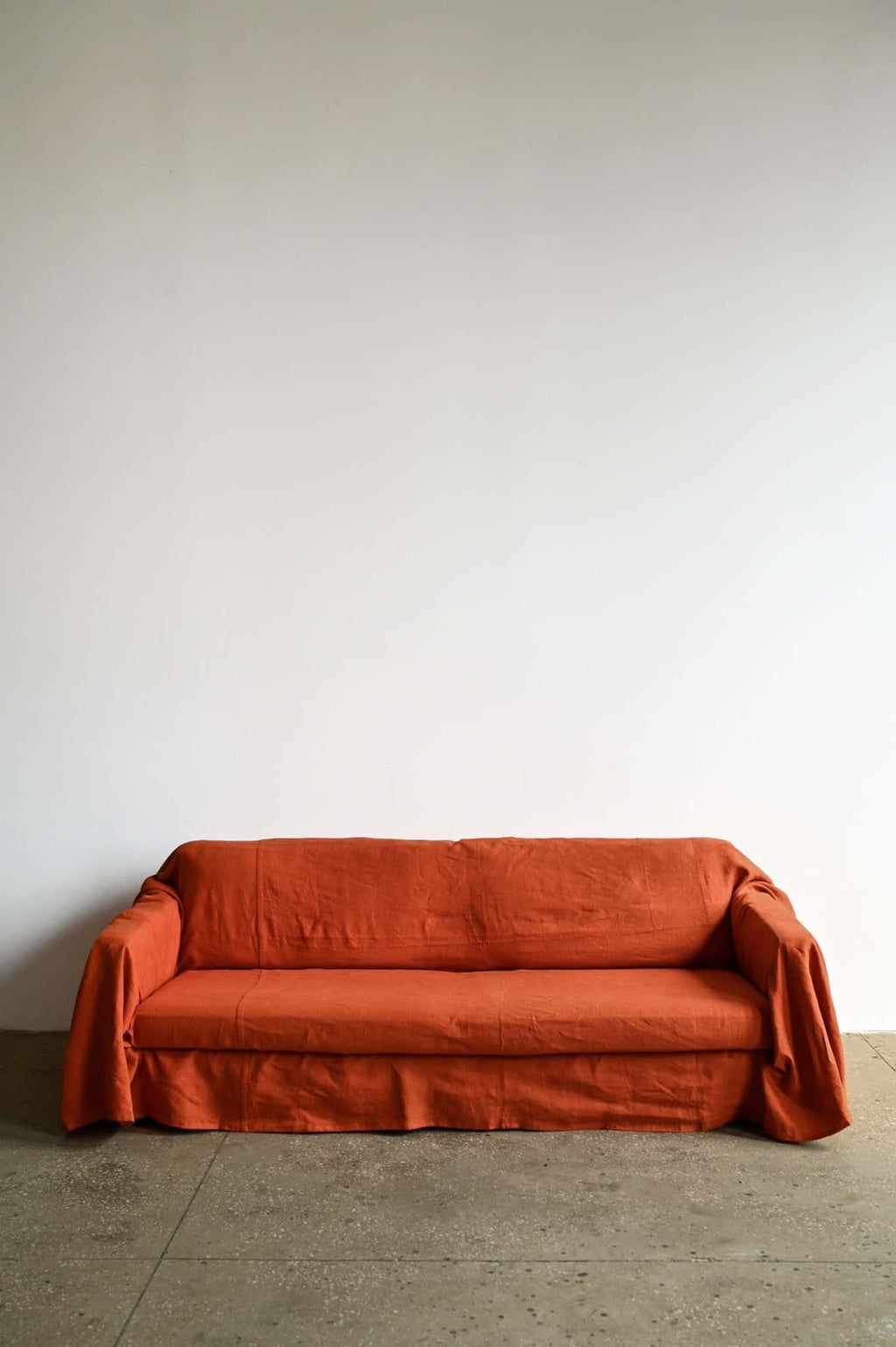 Burnt orange sofa slipcover - True Things