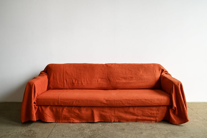 Burnt orange sofa slipcover - True Things