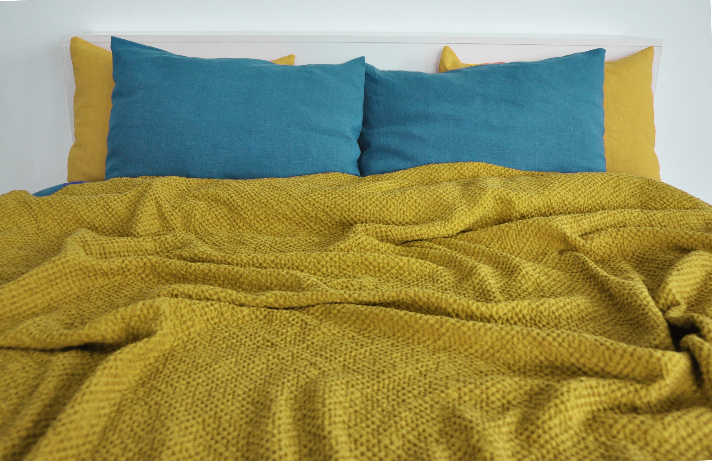 Mustard waffle linen coverlet