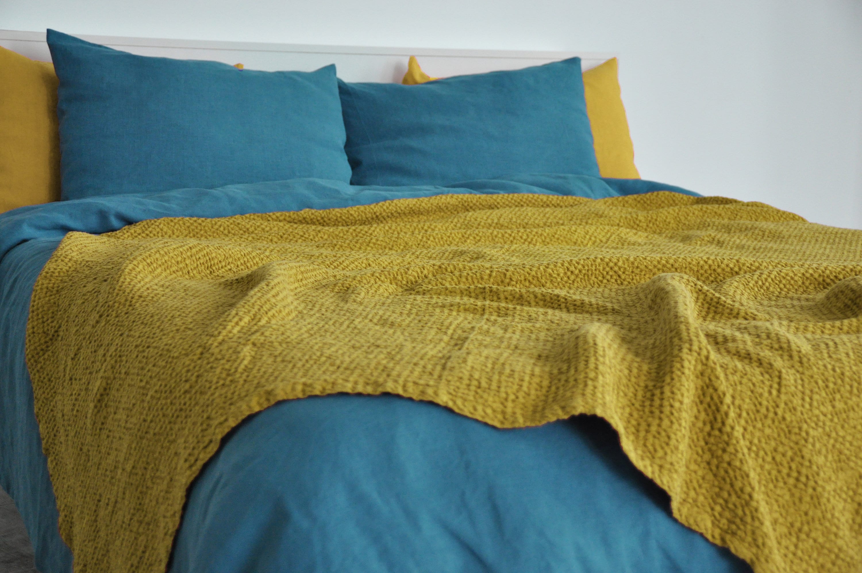 Mustard waffle linen coverlet
