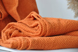 Burnt orange waffle coverlet